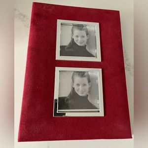 NWOT red suede 6x4” photo album.  Two 6x4” photos per pg. Holds 200 photos.